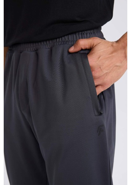 DeFactoFit Sporcu Jogger Eşofman Altı Slim Fit Dar Kesim Standart Paça Skuba Dalgıç Kumaş Beli Lastikli Düz Paça E3930AX24WN