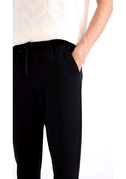 Beli Bağcıklı Cepli Düz Paça Basic Jogger Pantolon fırsatları