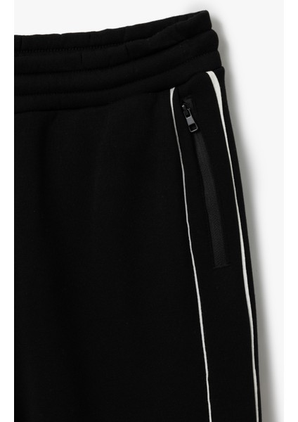 Fermuarlı Cepli Dikiş Detaylı Pamuk Karışımlı Beli Bağcıklı Eşofman Altı modelleri