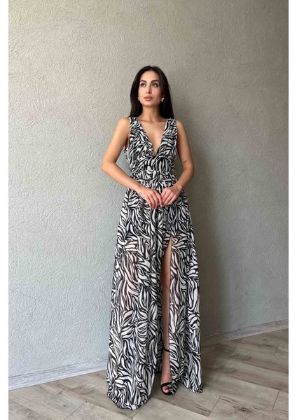 Siyah Desenli Yırtmaçlı Nice Elbise