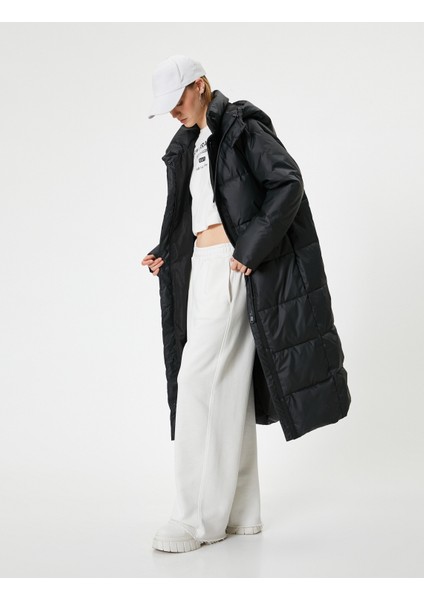 Uzun Şişme Mont Kapüşonlu Su Itici Özellikli Fermuarlı Cepli