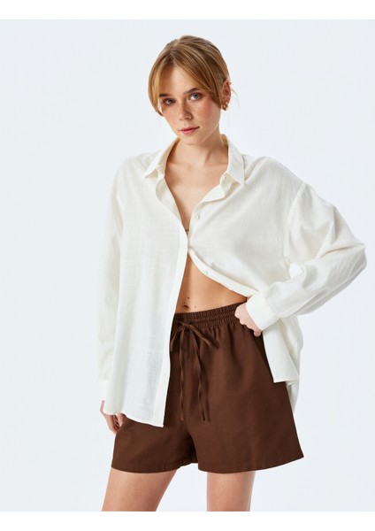 Pamuklu Regular Fit Cepli Beli Bağcıklı Kısa Şort fiyatları