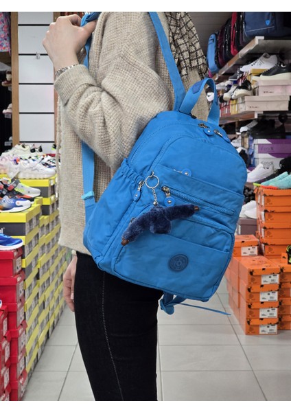 2113-8745 Kadın Krinkıl Kumaş Çok Gözlü Astarlı Petli Su Geçirmez Günlük Mini Sırt Çantası - NKT02113-BUZ-MAVI-TEKEBAT fırsatları