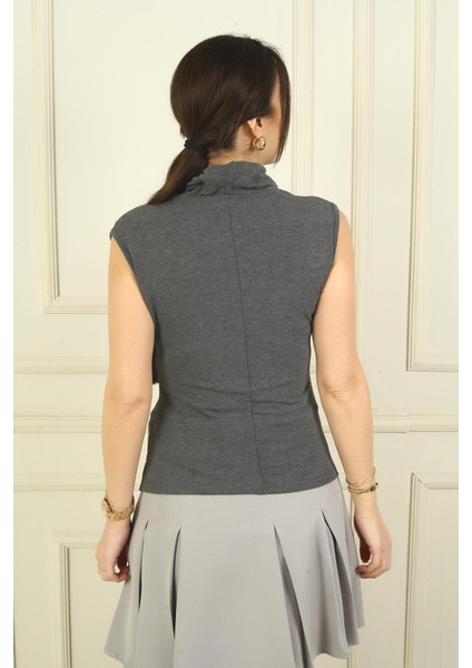 Kadın Degaje Yaka Önü Büzgülü Kolsuz Likralı Bluz fırsatları