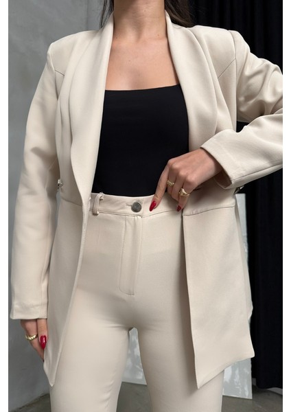 Kadın Ikili Blazer Ceket Pantolon Takım Pile ve Düğme Detaylı Boru Paça modelleri