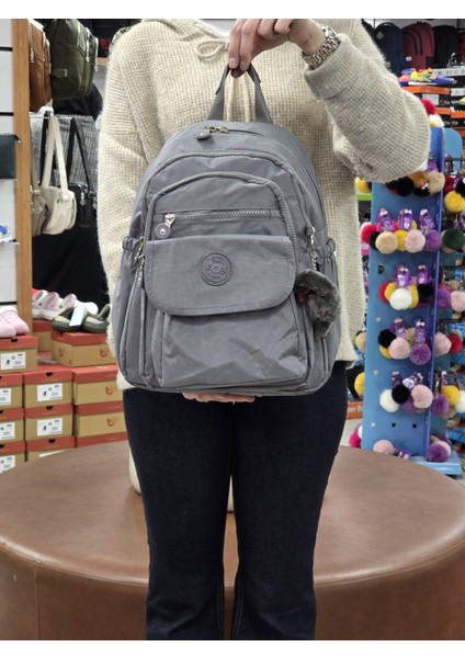 2114-8675 Kadın Krinkıl Kumaş Çok Gözlü Astarlı Petli Su Geçirmez Günlük Mini Sırt Çantası - NKT02114-FÜME-TEKEBAT modelleri