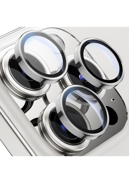 Apple iPhone 15 Pro / 15 Pro Max Ile Uyumlu Darbeye Dayanıklı Mekanizmalı Safir Kamera Lens Koruyucu Beyaz