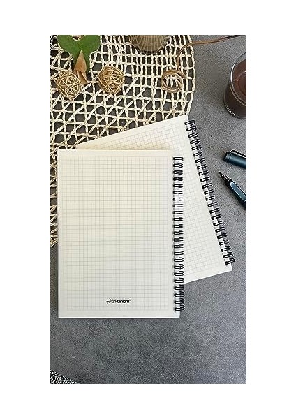 Tanıtım A5 (15X21CM) Boyutunda Şeffaf Kapağa Sahip Yırtılmaz Su Geçirmez Spiralli 60 Yapraklı (Kareli) modelleri