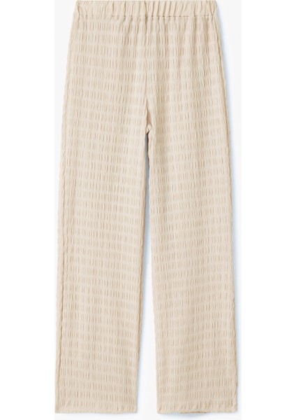 Beli Lastikli Dokulu Bol Paça Dokulu Pantolon