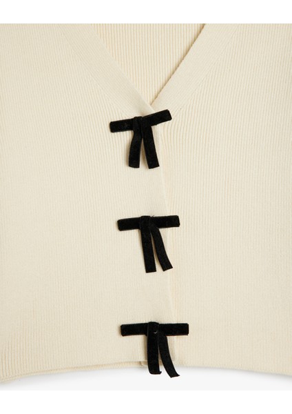 Uzun Kollu Fiyonk Detaylı V Yaka Triko Hırka fırsatları