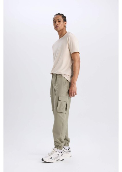 DeFactoFit Sporcu Jogger Eşofman Altı Slim Fit Dar Kesim Dokuma Kargo Cepli Standart Paça D3884AX24WN