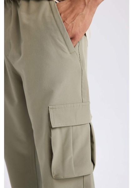 DeFactoFit Sporcu Jogger Eşofman Altı Slim Fit Dar Kesim Dokuma Kargo Cepli Standart Paça D3884AX24WN