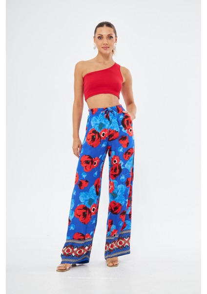 Kadın Kırmızı Çiçek Baskılı Paça Detaylı ve Dökümlü Yandan Cepli Palazzo Pantolon fiyatları