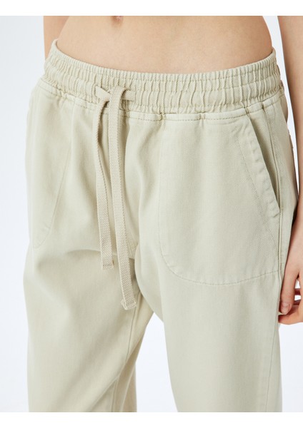 Cep Detaylı Beli Bağcıklı Düz Paça Chino Pantolon indirimleri