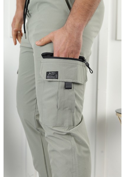 Paraşüt Kumaş Lastik Paça Fermuar Detaylı Jogger Pantolon fiyatları