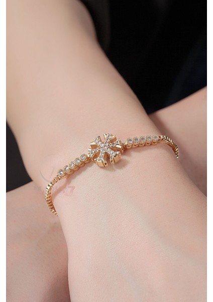 Kar Tanesi Detaylı Kadın Kol Saati ve Zirkon Taşlı Kar Tanesi Bileklik Sarı-Gümüş Renk modelleri