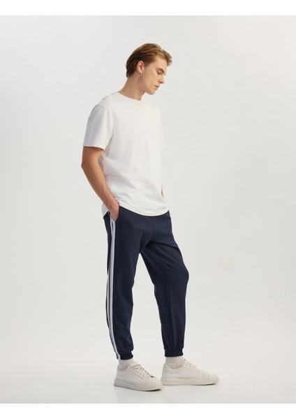 Şerit Detaylı Pamuk Karışımlı Beli Bağcıklı Eşofman Altı fiyatları