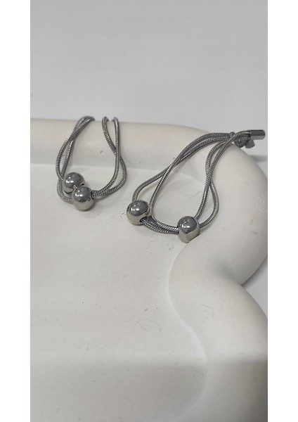 Sallantılı Ucu Boncuklu Gold ve Gümüş Kadın Çelik Küpe fiyatları