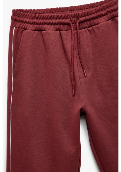 Cep Detaylı Pamuk Karışımlı Biyeli Beli Bağcıklı Eşofman Altı indirimleri