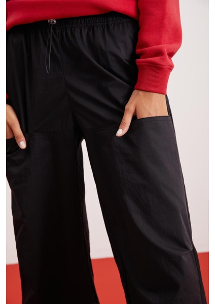 Annelıse Kadın Su Geçirmez Paraşüt Kumaş Beli Ve Paçası Lastikli Relaxed Siyah Pantolon fiyatları