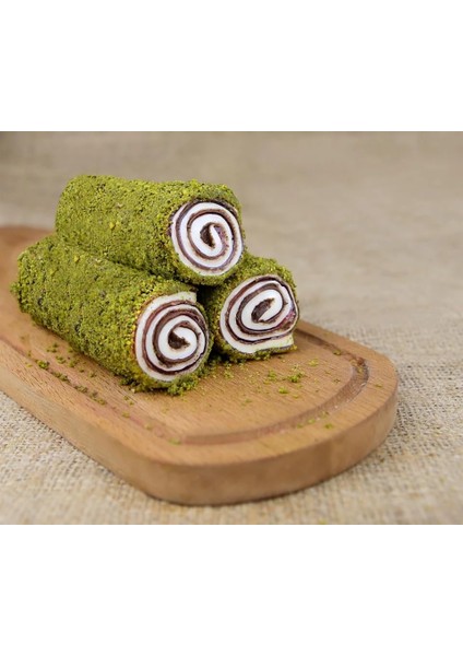 Toz Fıstık Kaplı Nar Aromalı Sürme Kakao Fındık Kremalı Sarma Lokum
