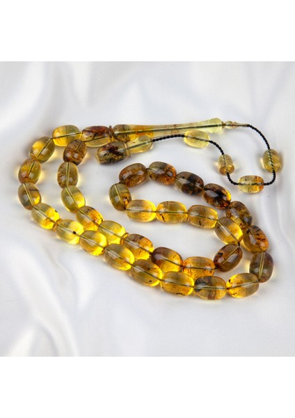 Dominik Mavi Kaya Fosil Amber Badem Kesim 10.8X15 Mm Tesbih