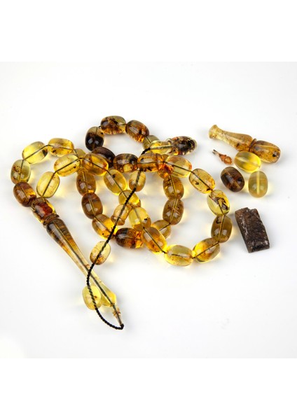 Dominik Mavi Kaya Fosil Amber Badem Kesim 10.8X15 Mm Tesbih