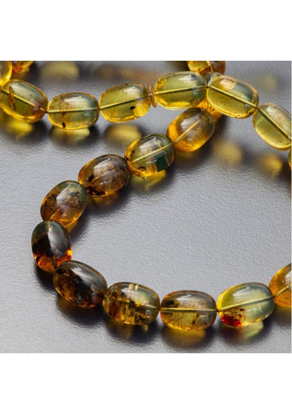 Dominik Mavi Kaya Fosil Amber Badem Kesim 10.8X15 Mm Tesbih