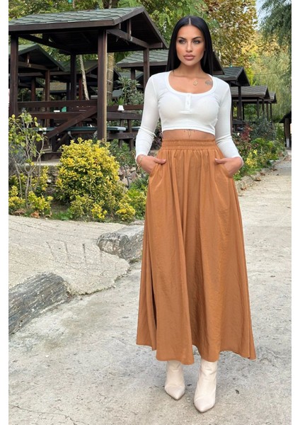 Taba Lastikli Yüksek Bel, A Kesim, Dökümlü ve Salaş, Uzun Kupra Etek modelleri