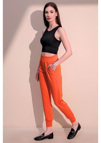 Kadın Oranj Rahat Dokulu Kumaş Cepli Beli Lastikli Paça Jogger Spor Pantolon fiyatları