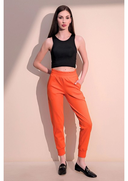 Kadın Oranj Rahat Dokulu Kumaş Cepli Beli Lastikli Paça Jogger Spor Pantolon modelleri