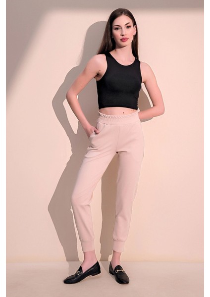 Kadın Bej Rahat Dokulu Kumaş Cepli Beli Lastikli Paça Jogger Spor Pantolon modelleri