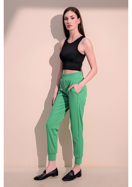 Kadın Yeşil Rahat Dokulu Kumaş Cepli Beli Lastikli Paça Jogger Spor Pantolon fiyatları