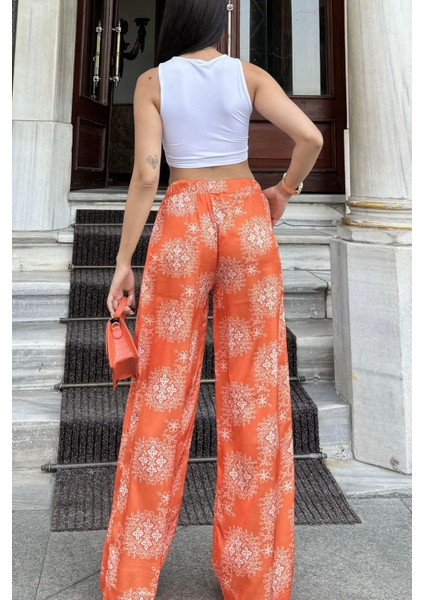 Kadın Turuncu Yeni Stil Etnik Desenli, Beli Lastikli, Salaş Rahat Saten Pantolon modelleri