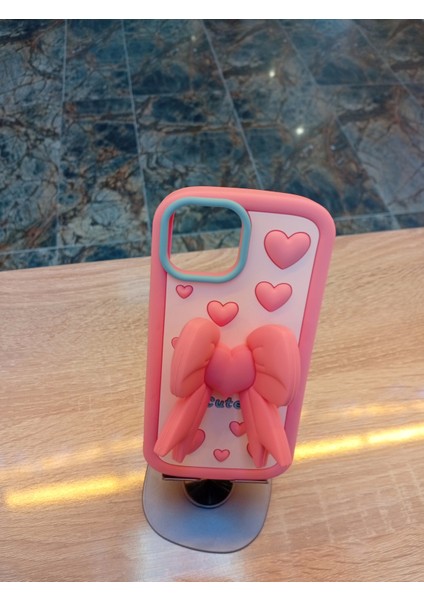 iPhone 15 Uyumlu Pembe Renk Kurdele Tasarım Kılıf Kurdelesi Stand Olabilen Yumuşak Dokulu Kapak