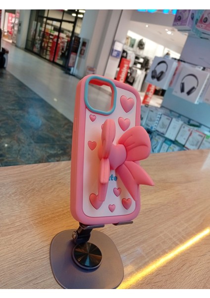 iPhone 15 Uyumlu Pembe Renk Kurdele Tasarım Kılıf Kurdelesi Stand Olabilen Yumuşak Dokulu Kapak