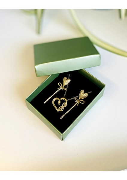Çelik Takı Seti Gold Renk Kalp Model Sonsuzluk Detay Kadın Kolye ve Sallantılı Kalp Küpe modelleri
