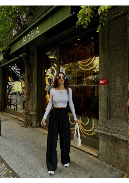 Beli Lastikli Çimalı Pantolon