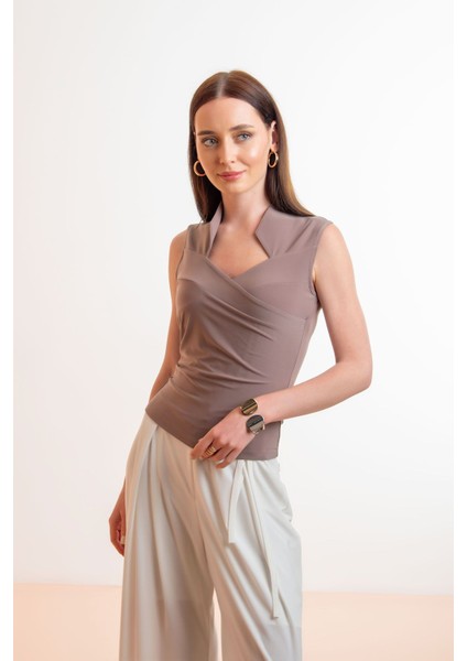 Dik Kruvaze Yaka Bluz indirimleri