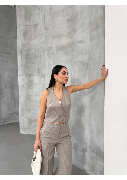 Kadın Çizgili Kruvaze Yaka Tek Düğmeli Yelek Pantolon Takım modelleri