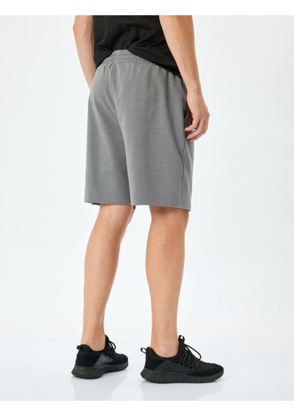 Kargo Cepli Pamuk Karışımlı Straight Fit Beli Bağcıklı Spor Şort fırsatları
