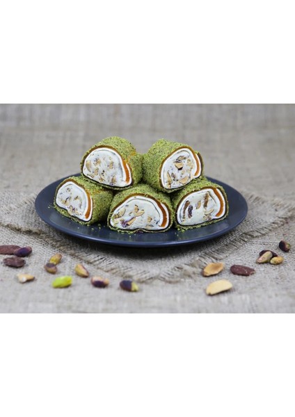 Toz Antep Fıstığı Kaplı Portakal Aromalı Fındık Kreması Dolgulu Bademli Lokum