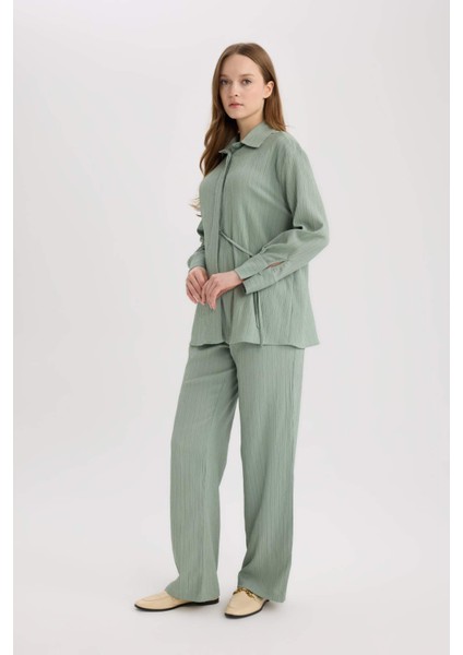 Wide Leg Cep Detaylı Standart Paça Krinkıl Kumaş Pantolon D8680AX25SP