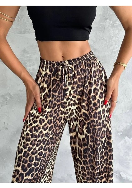 Kadın Varak Baskılı Leopar Desenli Mevsimlik Beli Lastikli Geniş Paça Pantolon fiyatları