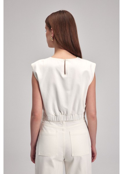 Kolsuz Beli Lastikli Crop Bluz Kemik 11542440001