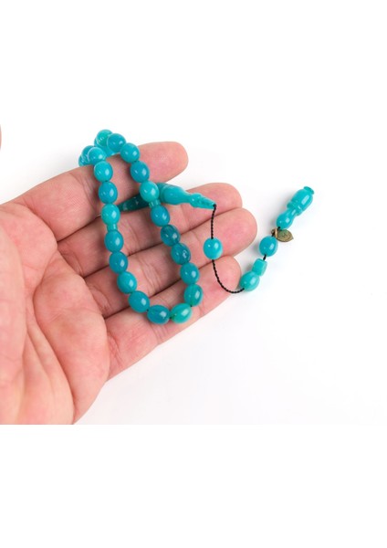 Sıkma Kehribar Beyzi Kesim Bilek Boy 7x8.5mm Tesbih - Turkuaz fiyatları