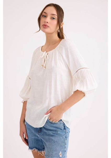 Kolu Lastikli Önü Bağlamalı Keten Bluz fırsatları