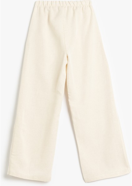 Beli Bağcıklı Viskon ve Keten Karışımlı Bol Paça Pantolon fiyatları