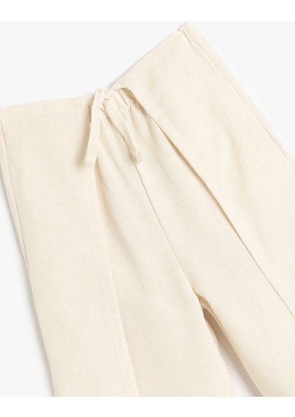 Beli Bağcıklı Viskon ve Keten Karışımlı Bol Paça Pantolon modelleri
