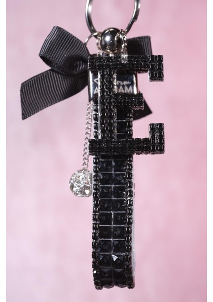 Siyah Bagetli Anahtarlık & Siyah E Harf & Gümüş Minik Top & Siyah Kurdela indirimleri